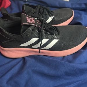 Black and pink Adidas sneakers